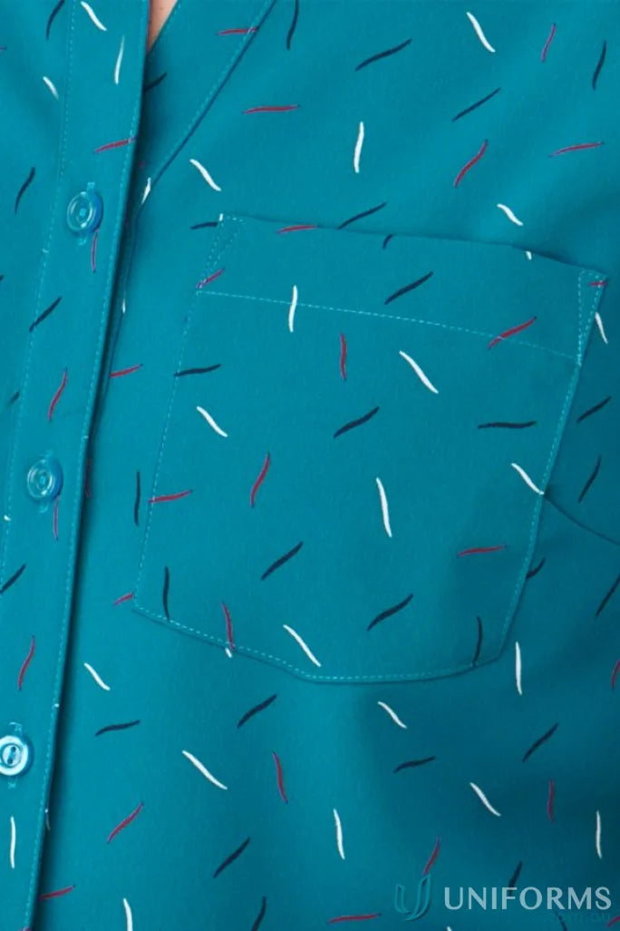 Teal City Stretch Spot Tunic with confetti pattern and chest pocket