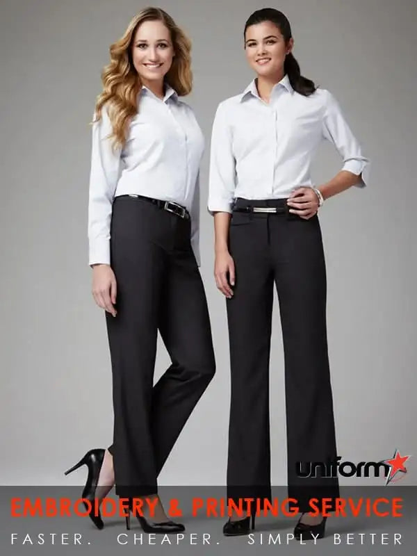 Two women in business attire wearing Womens Classic Flat Front Tailored Pant from bs29320 Biz Collection