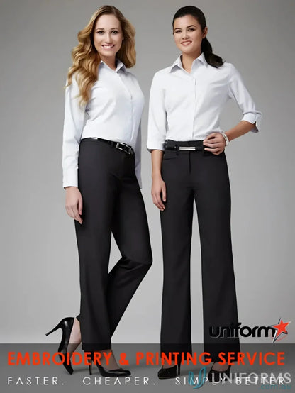 Two women in business attire wearing Womens Classic Flat Front Tailored Pant from bs29320 Biz Collection