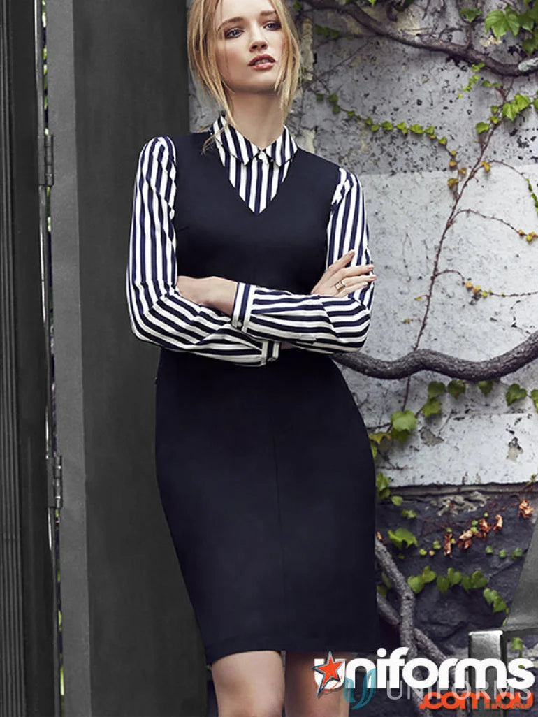 Black cool stretch sleeveless VNeck dress with striped shirt for a chic look