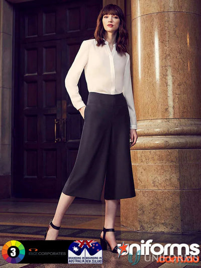 Woman wearing stylish Siena Mid Length Culottes and blouse outfit, perfect workwear