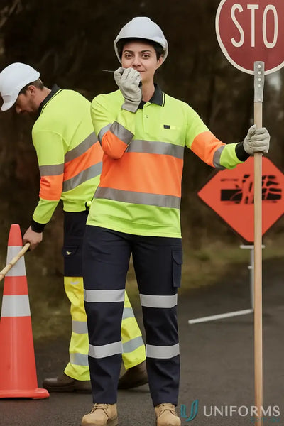 Female construction worker in high-vis Syzmik Unisex Bio Motion Taped LS Polo Zh380