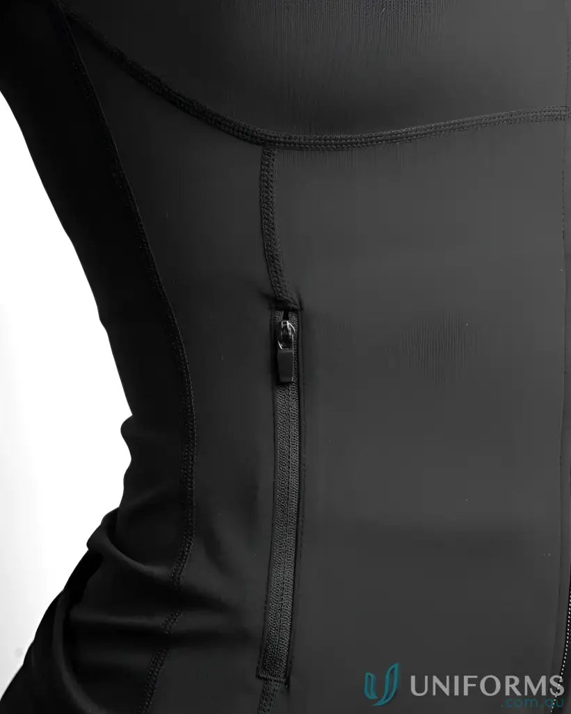 Black zippered side seam of a form-fitting contour zip jacket perfect for work uniforms and athletic workwear