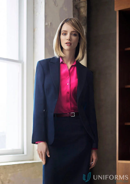 Woman in dark blue cool stretch longline ladies jacket biz collection with hot pink blouse