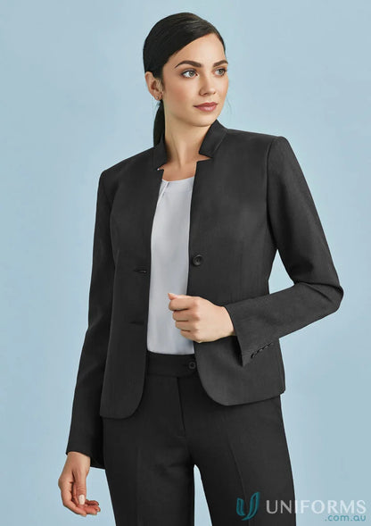 Woman modeling Biz Collection Cool with Reverse Lapel black suit and white top