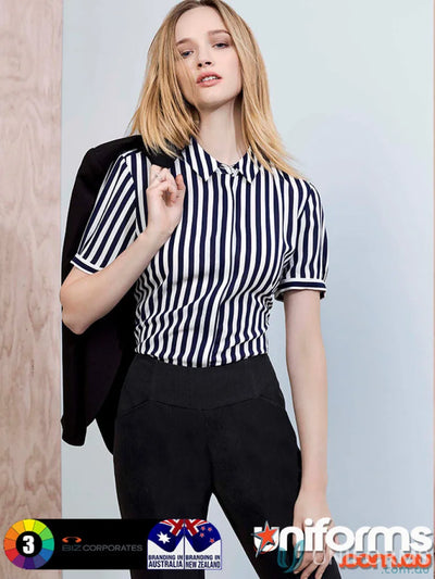 Woman wearing cool stretch striped bandless slim leg pant and black pants