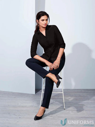 Woman in black blouse and navy pants showcasing Cool Stretch Ultra Comfort Waist Pant