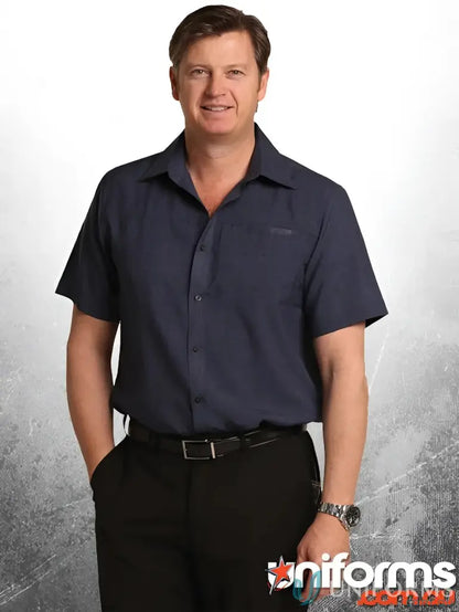 Man in navy cooldry short sleeve Winning Spirit M7600S Men’s CoolDry shirt