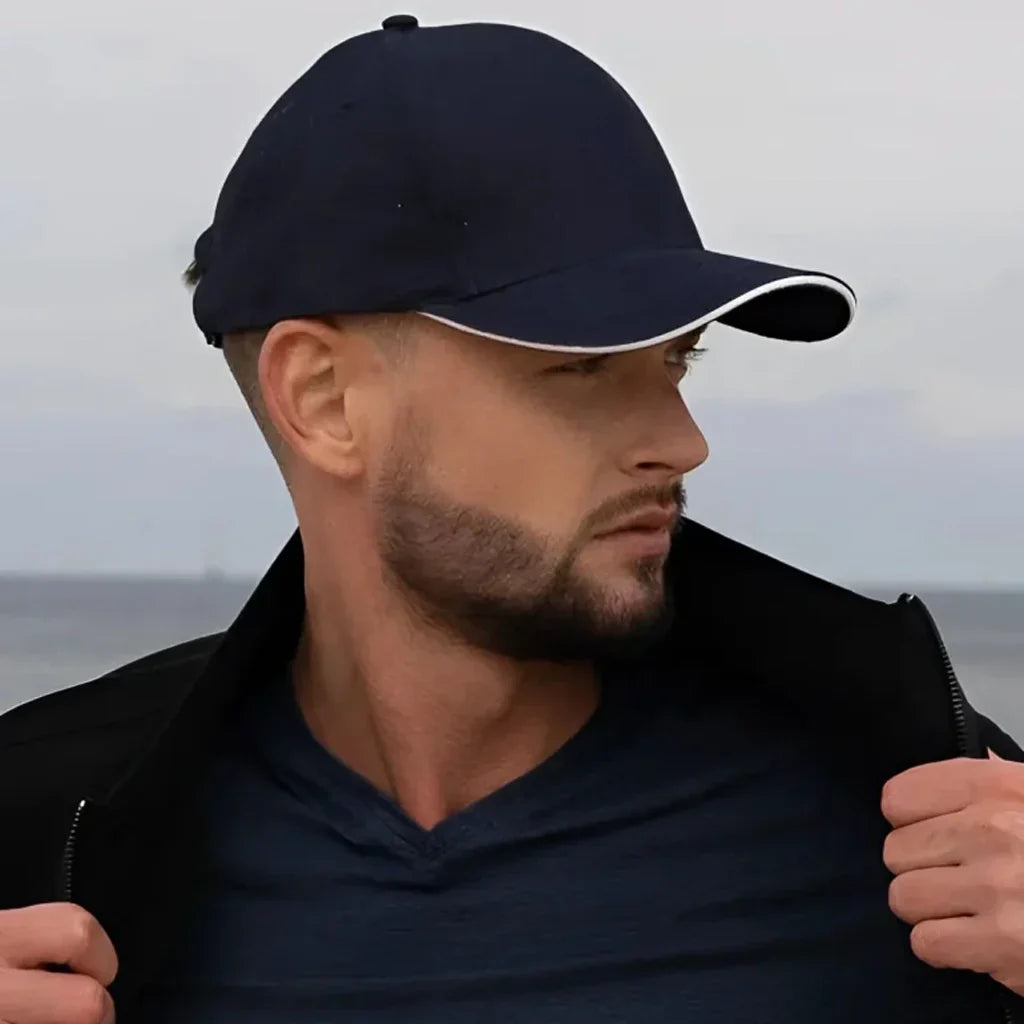 Navy blue cotton cap with white sandwich trim, custom imprint, 10 centimeter inch