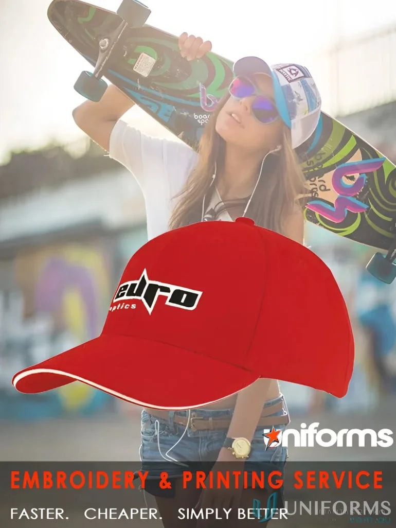 Red baseball cap with cotton sandwich trim and custom imprint for a wide stock range