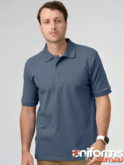 Man in a blue pique polo from PS55 Darling Harbour Polo collection at Darling Harbour