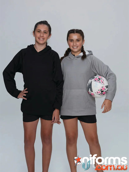 Two young girls wearing Crusader Kids Hoodies and shorts in casual workwear style