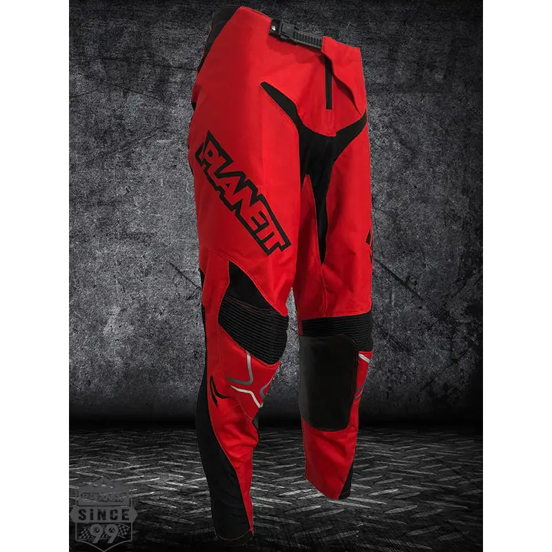 Red and black diesel mx motocross pants with reinforced knee panels perfect for durable workwear or uniforms