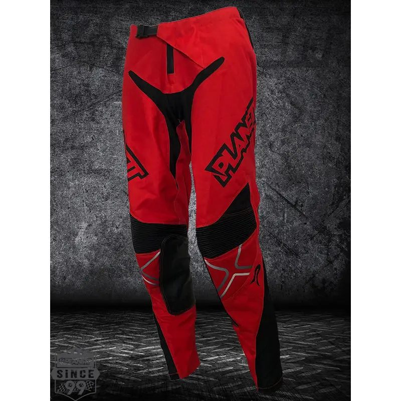 Custom diesel mx pant in red and black with bold range branding and reinforced knees perfect for rugged workwear