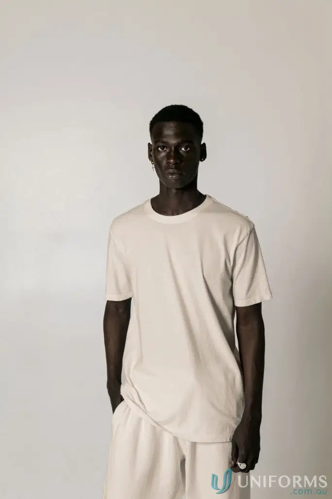 Beige regular fit Bobby Tee PFD with nameless CB embroidery and matching shorts