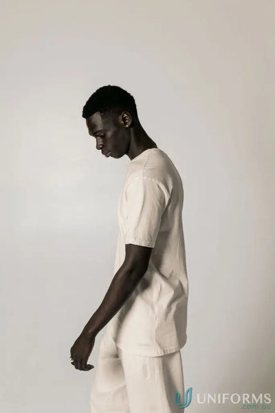 Man in beige Bobby Tee PFD with regular fit and nameless CB embroidery