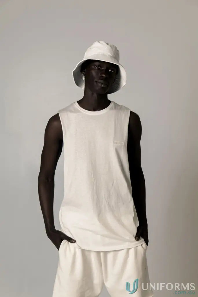 Man in white Cotton Tank Top with raw cut sleeve and nameless chest embroidery