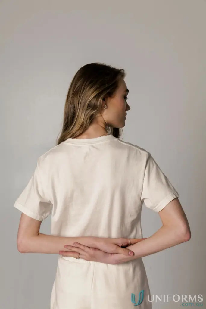 Cream-colored Donald Tee with retro fit and higher ribbed neckline for style