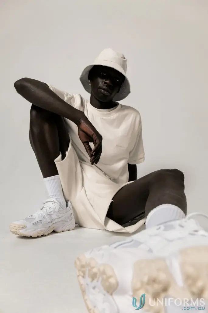 Man in matching bucket hat and Retro Fit Donald Tee with higher ribbed neckline