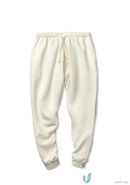 Cream-colored Tommy Trackpant PFD made of brushed French terry material, comfy track pant