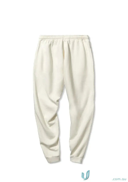 Cream-colored Tommy Trackpant PFD made with comfy brushed French terry material