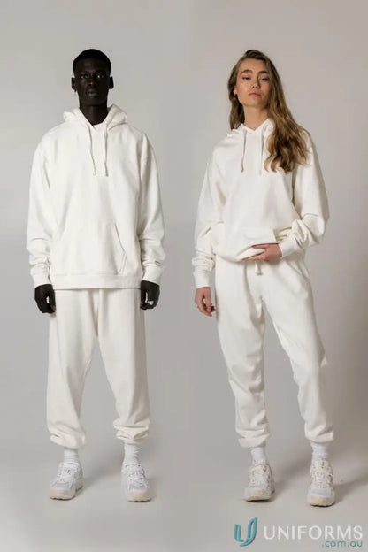 Two people wearing matching Tommy Trackpant PFD in brushed French terry material