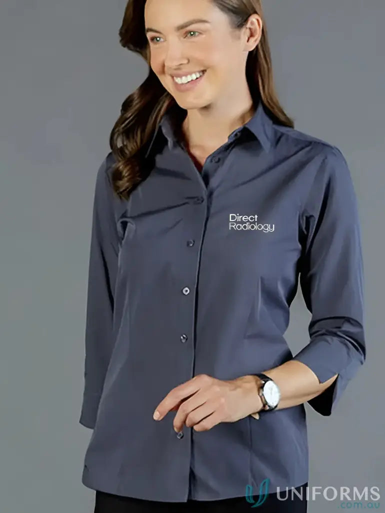 Woman in easy iron gray button-up shirt from Direct Radiology EMB 3Q workwear uniforms