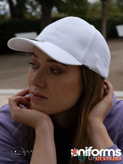 White fitted cap with textured crown and smooth brim, perfect for uniforms and dream fit