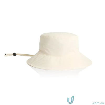 Cream-colored durable nylon wide brim bucket hat with adjustable chin strap