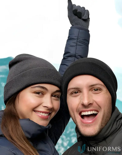 Smiling couple in eco roll RPET knit beanie, showing off stylish winter gear