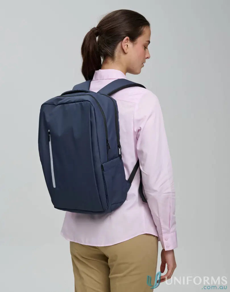 Blue Elite PU Backpack on a person perfect for staying organized and winning spirit elite style