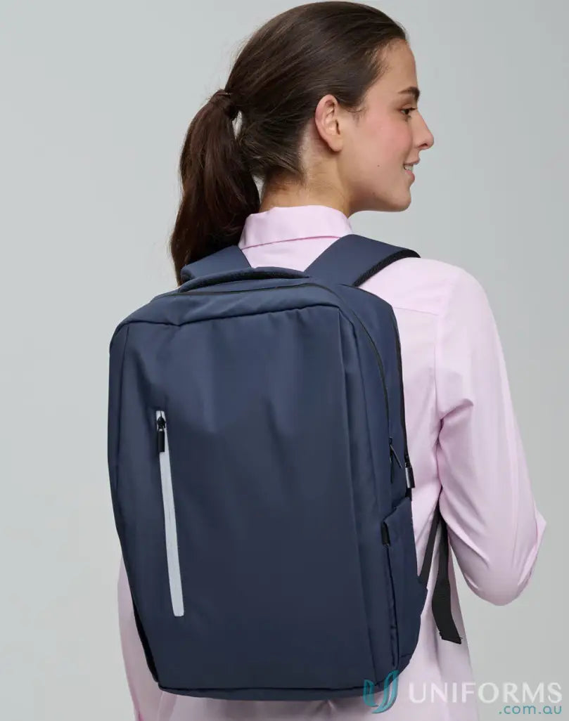 Navy blue Elite PU Backpack with white zipper, perfect for staying organized and showing winning spirit elite