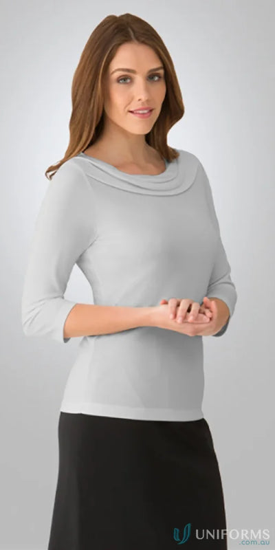 Woman in Eva Knit 3Q Top with gray cowl-neck and black skirt showing knit style