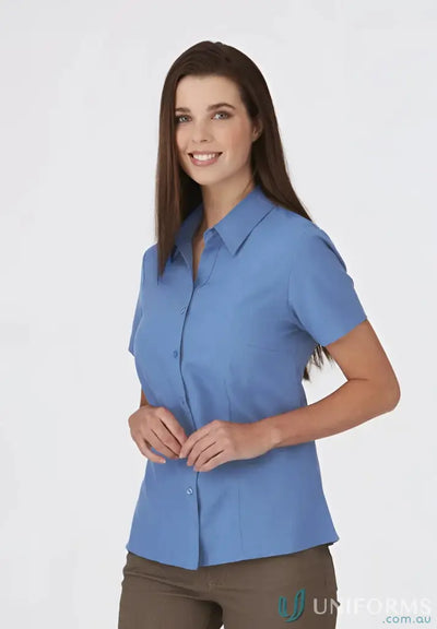 Light blue short-sleeved collared shirt perfect for work uniforms and workwear