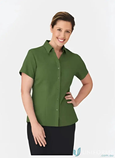 Woman in olive green Ezylin Ladies S/S Shirt workwear for stylish work uniforms
