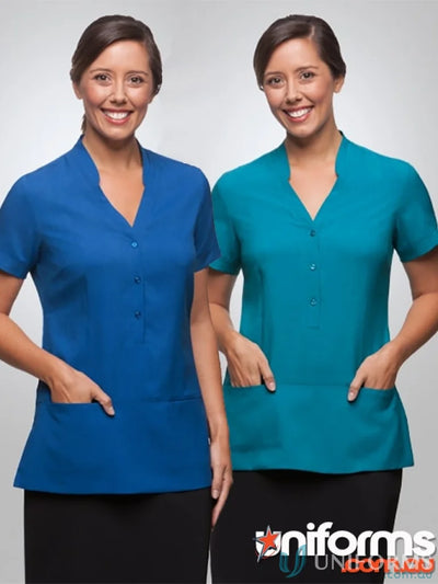 Two women in breathable polyester Ezylin Tunic uniforms showing workwear style
