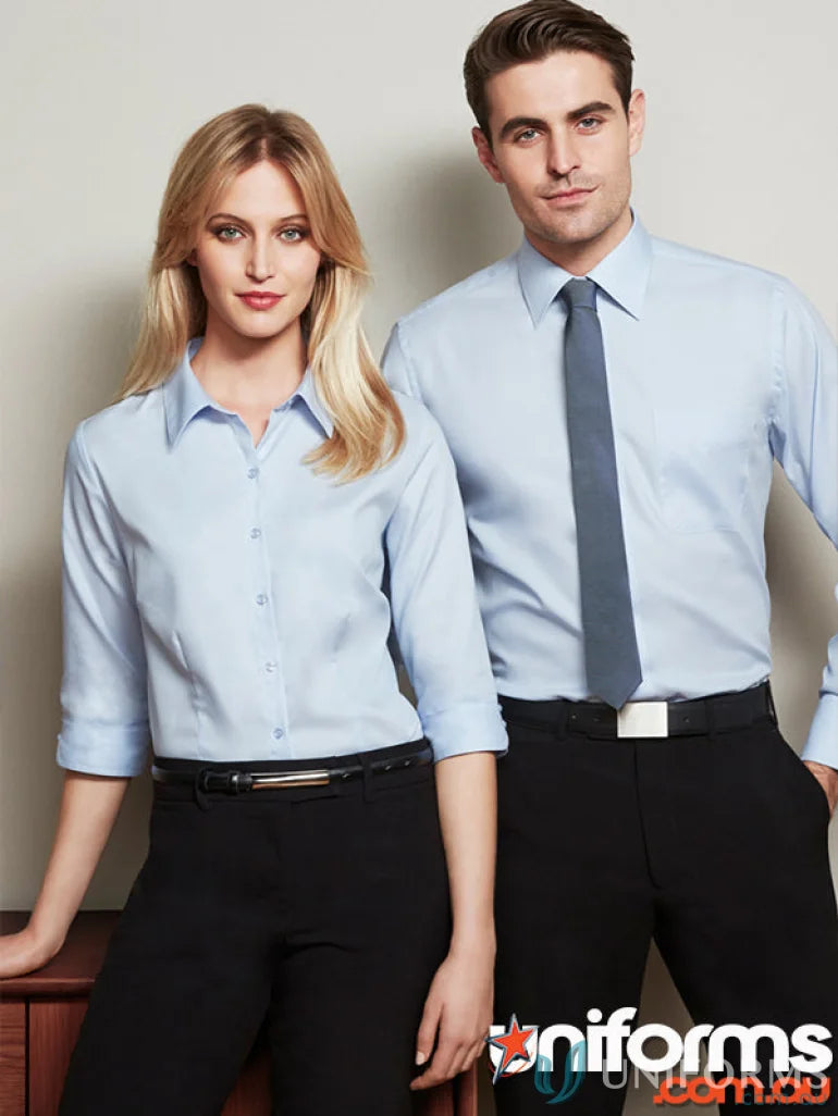 Two women modeling light blue FMV EMB Ladies Premium Cotton Shirt mini herringbone workwear uniforms