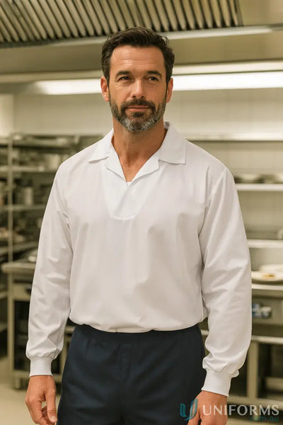 Man in white food industry jac shirt modesty and dark trousers for workcraft food industry