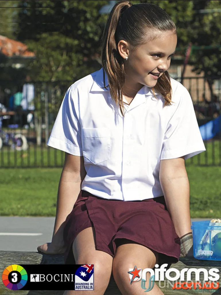 Girl wearing a stylish short sleeve school shirt from Girls SS School Shirt collection