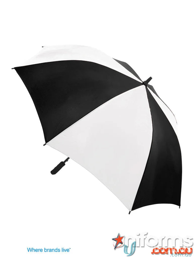 Black and white Gusto Umbra umbrella with high quality wind-resistant frame sitting on a surface