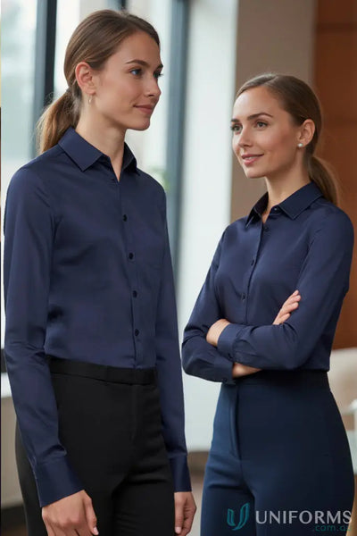 Two women in navy blue monaco long sleeve shirts from Biz Collection Ladies collection