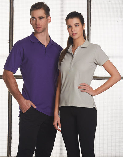 Man and woman in matching Heathmont TrueDry pique polo shirts, purple and gray