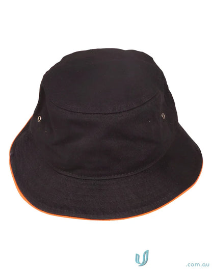Black bucket hat with orange trim made from heavy brushed cotton, ch31 soft washed style