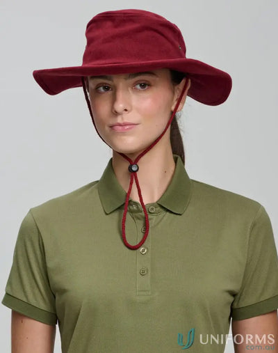 Woman in winning spirit heavy brushed cotton hat with sun protection and chin strap