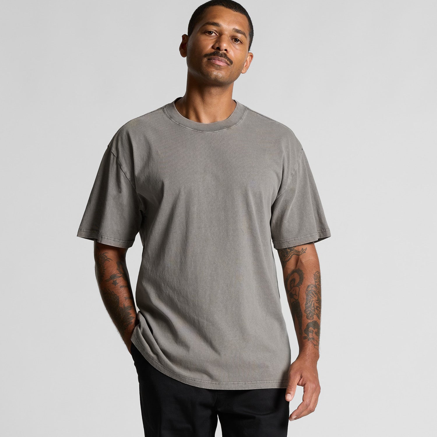Charcoal gray crew neck t-shirt with short sleeves and a relaxed fit.