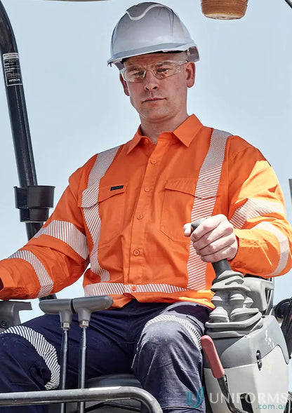 Construction worker in safety gear wearing Hi Vis X Back Shirt with segmented tape and reflective tape for NSW Rail
