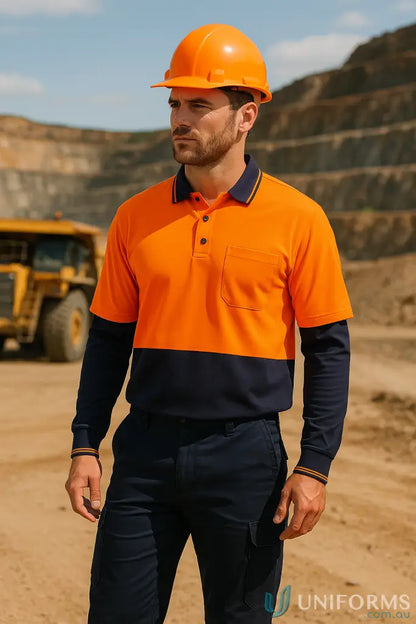 Men’s two-tone orange and navy workwear polo shirt with long sleeves, ideal for uniforms