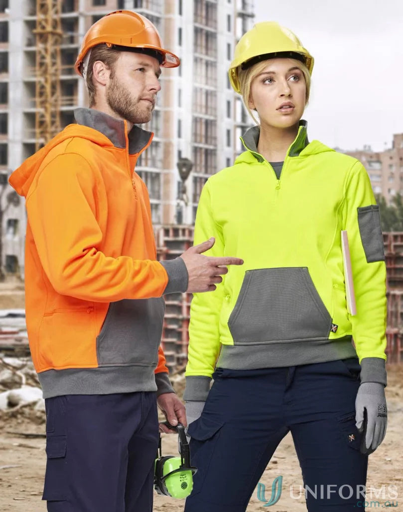 Two construction workers in safety gear wearing HiVis Qtr Zip Premium Fleece Hoodie showing winning spirit