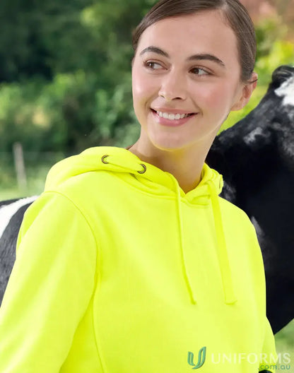 Smiling young woman in neon yellow HiVis Water Resistant Fleece Hoodie SW91