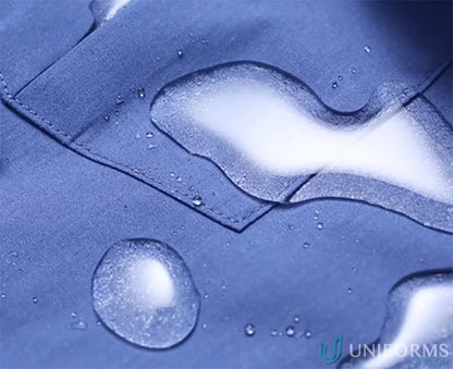 Water-repellent blue hospitality nano workwear shirt with beaded water droplets